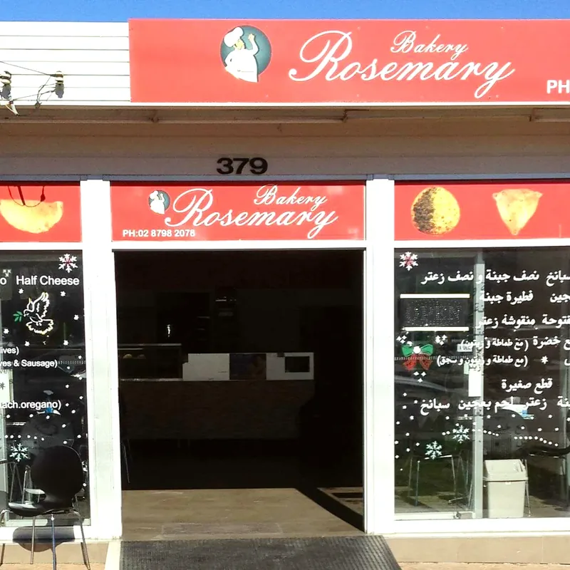 The shopfront at 379 Hamilton Rd, with the red Rosemary Bakery sign